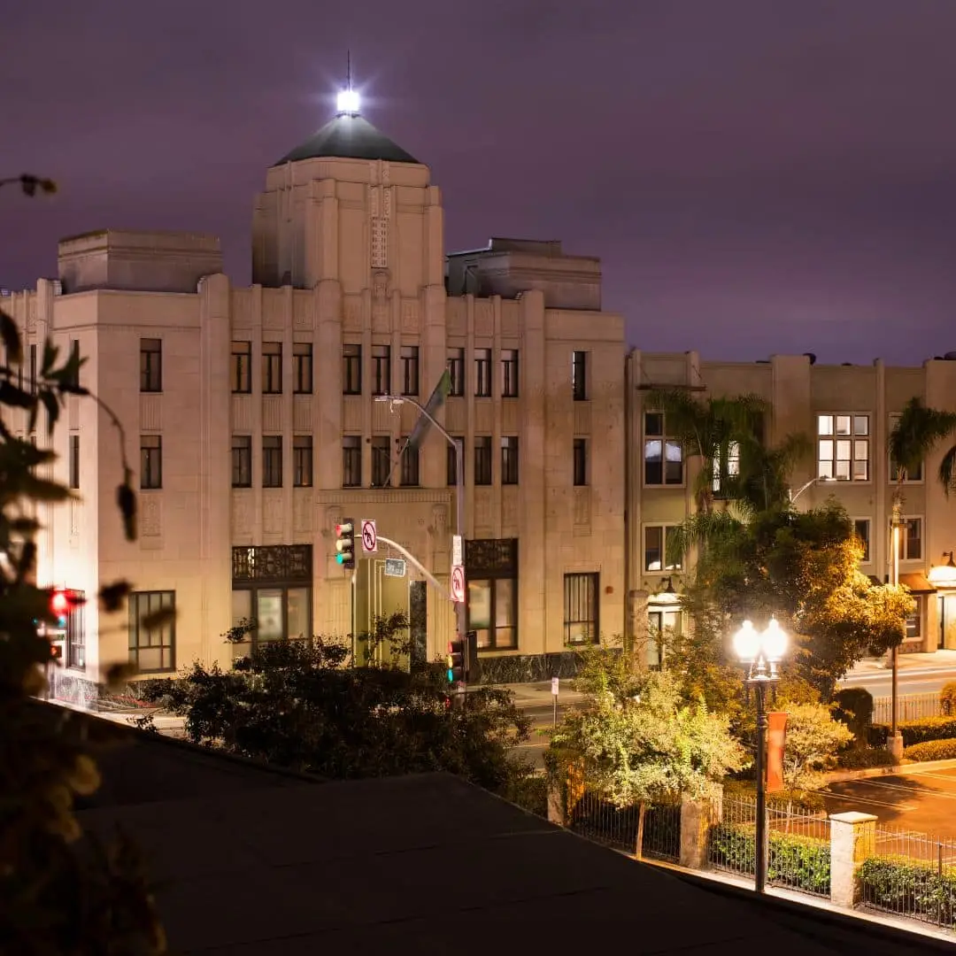Santa Ana art deco courthouse lit at night near Main and Civic Center – car accident attorney Santa Ana